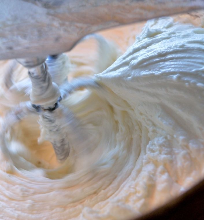 a mixer hipping homemade hair butter until fluffy