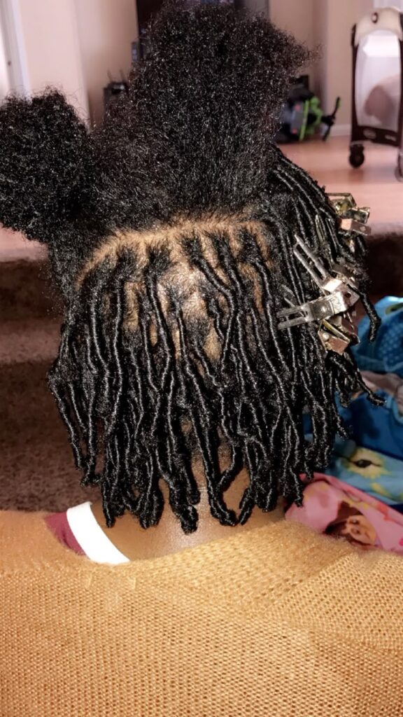 Healthy natural 4C hair ready for starting locs