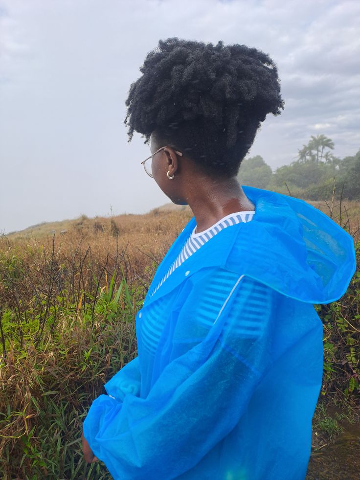 Woman with natural 4C hair in humid rainy weather