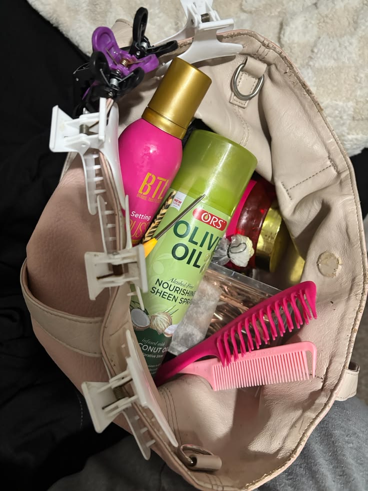 Natural hair products packed for a summer trip