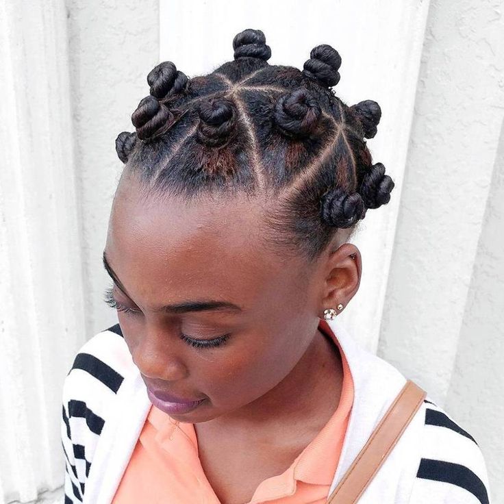 Woman wearing Bantu knots as a natural hairstyle