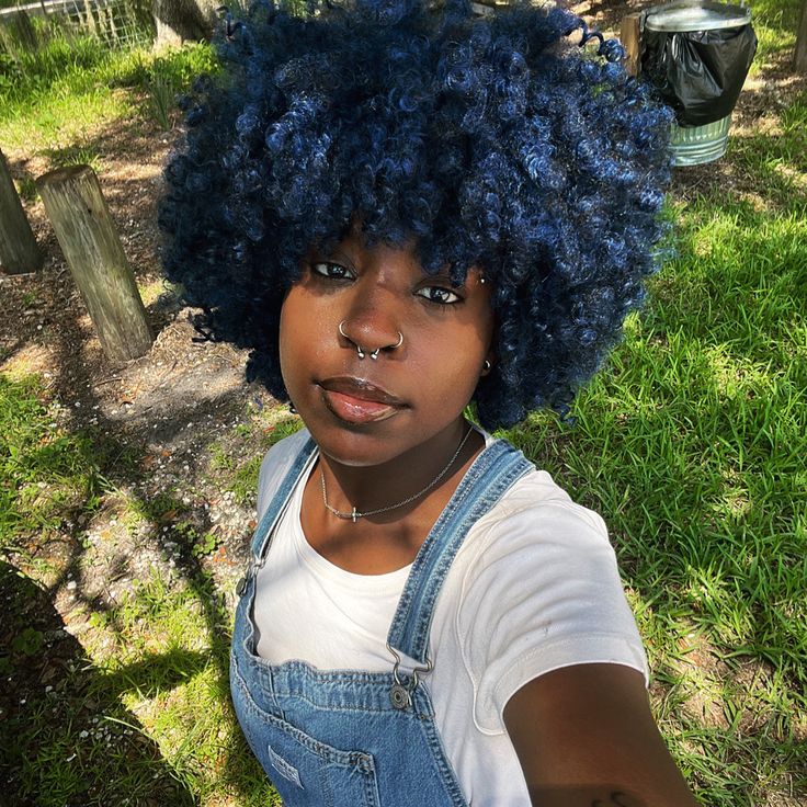 Black woman with blue-black natural hair