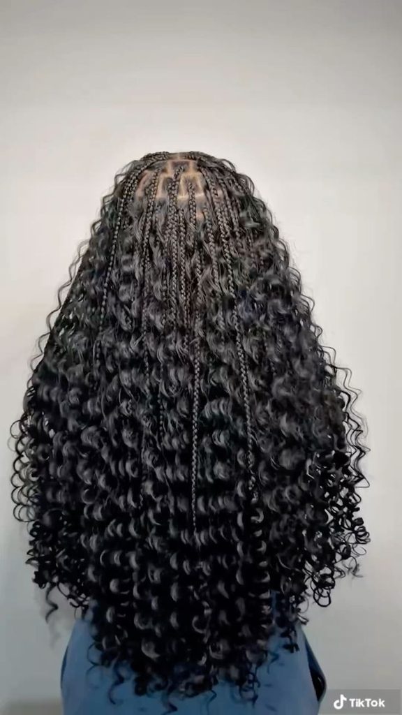 Bohemian knotless braids with curly pieces