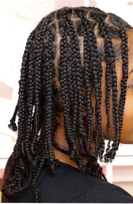 Box braids installed on transitioning natural hair