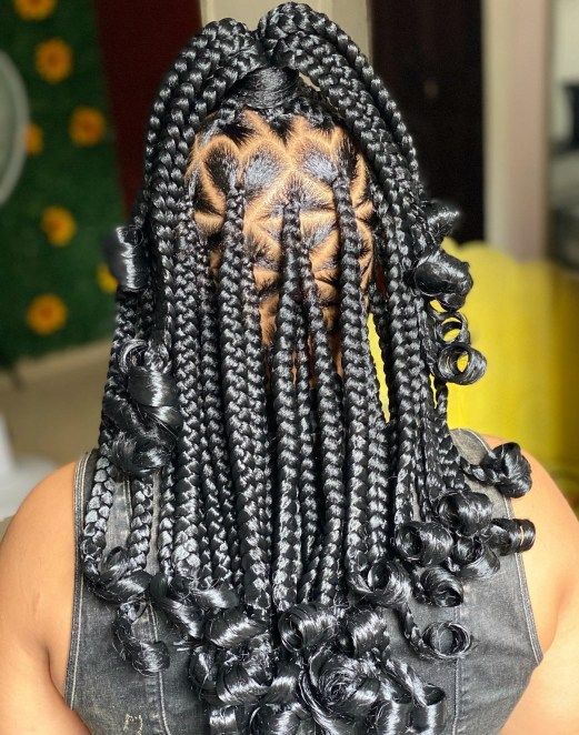 Woman wearing a half-up half-down braided hairstyle