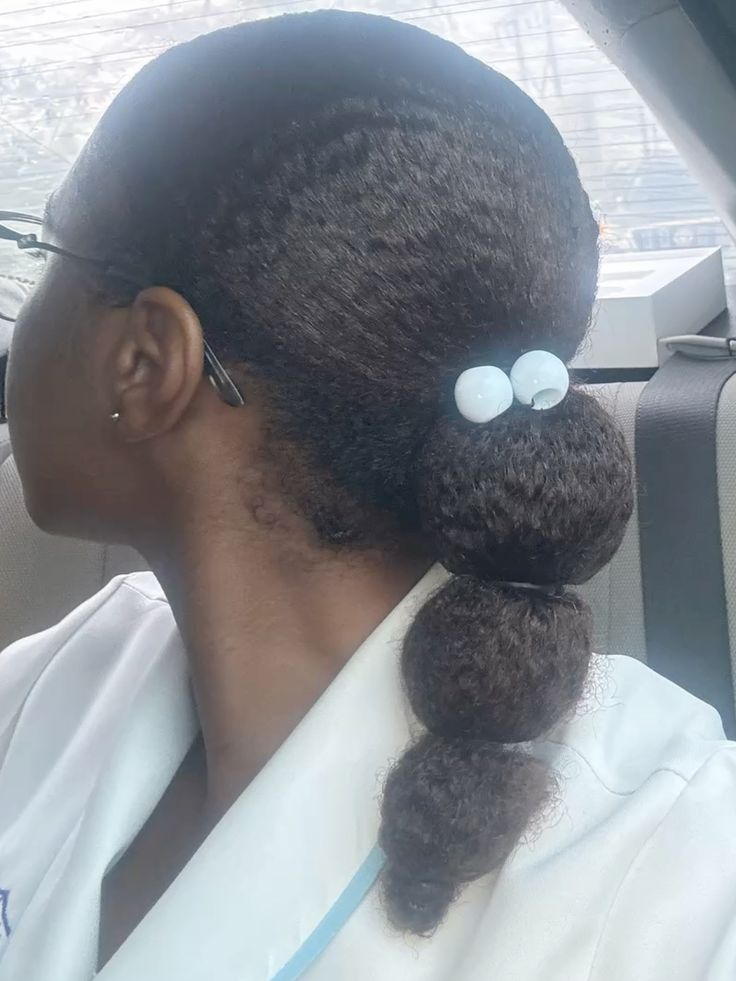 Bubble ponytail hairstyle for natural 4C hair