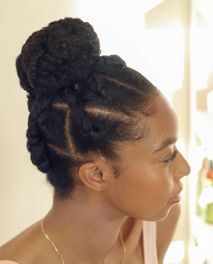 Woman wearing a chunky twist updo on natural hair