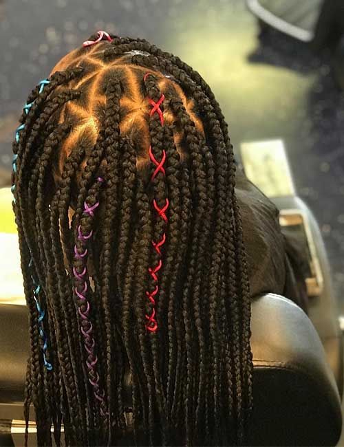 Natural hairstyle decorated with colorful hair thread