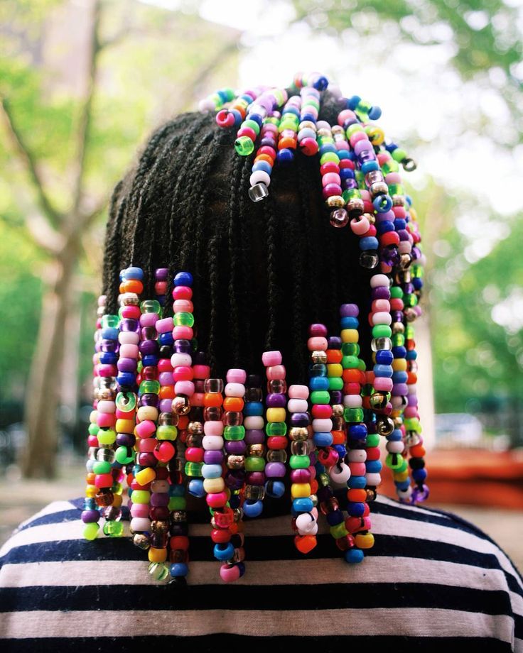 Natural braids decorated with colorful beads