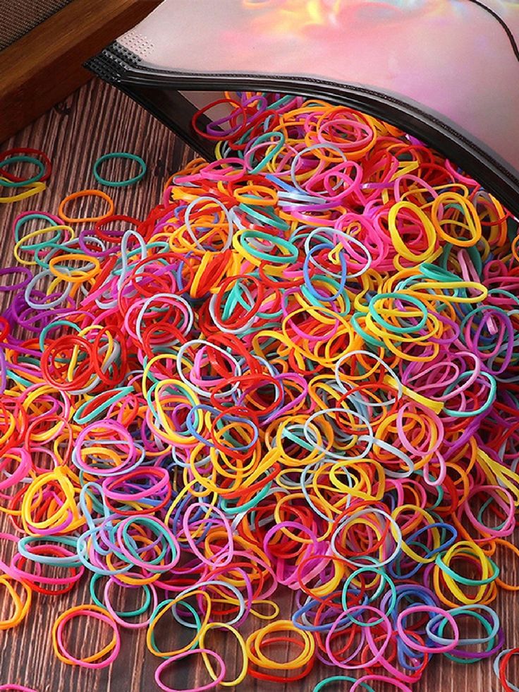 Natural hair styled with colorful elastic bands