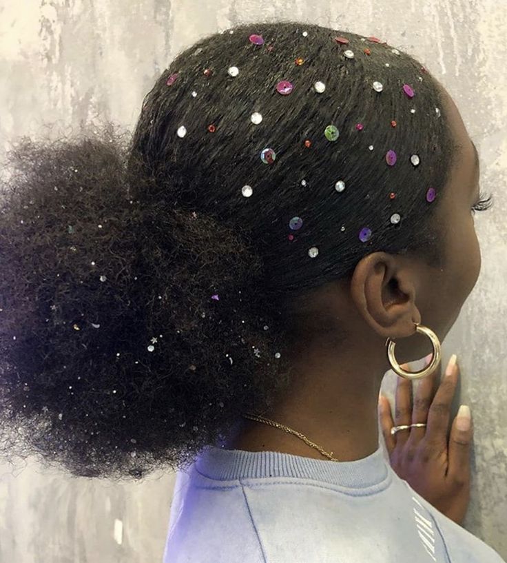 Natural updo decorated with crystal hair accessories