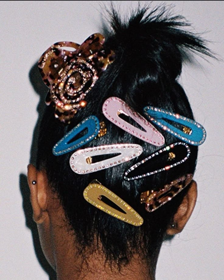 Woman wearing decorative barrettes with natural hair