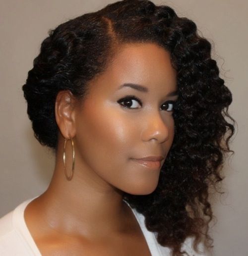 Natural twist-out styled with a deep side sweep