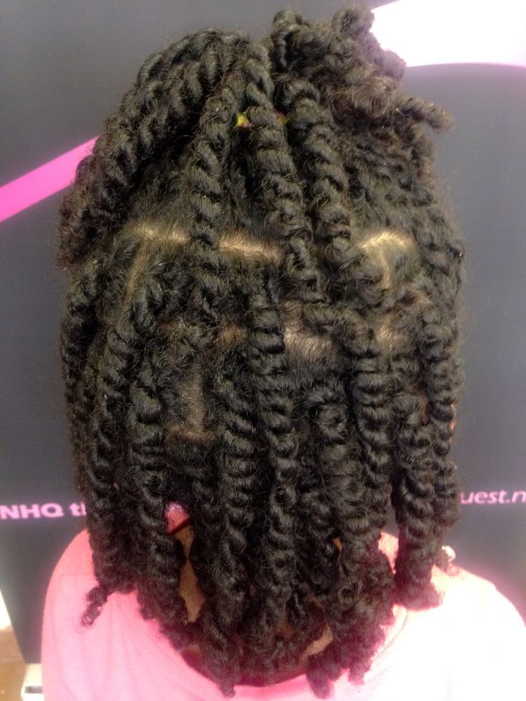 Child wearing a comfortable low manipulation hairstyle for 4C natural hair