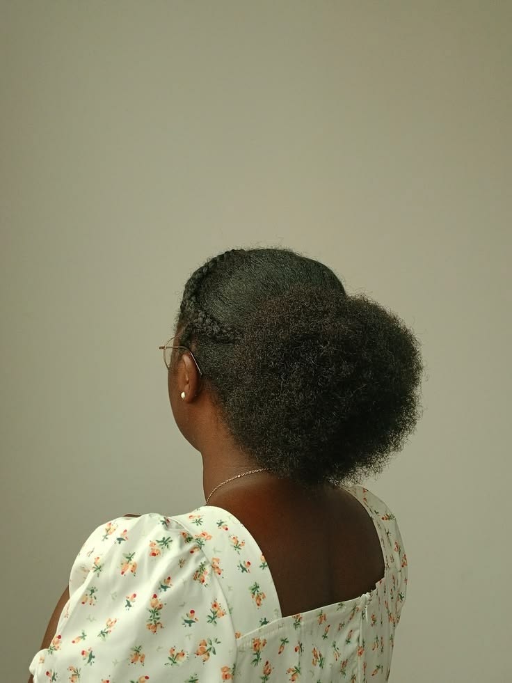 Elegant low puff hairstyle on natural 4C hair