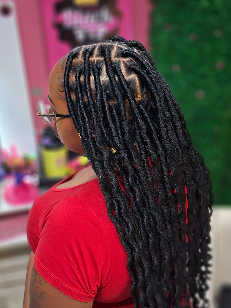 Long faux locs protective hairstyle