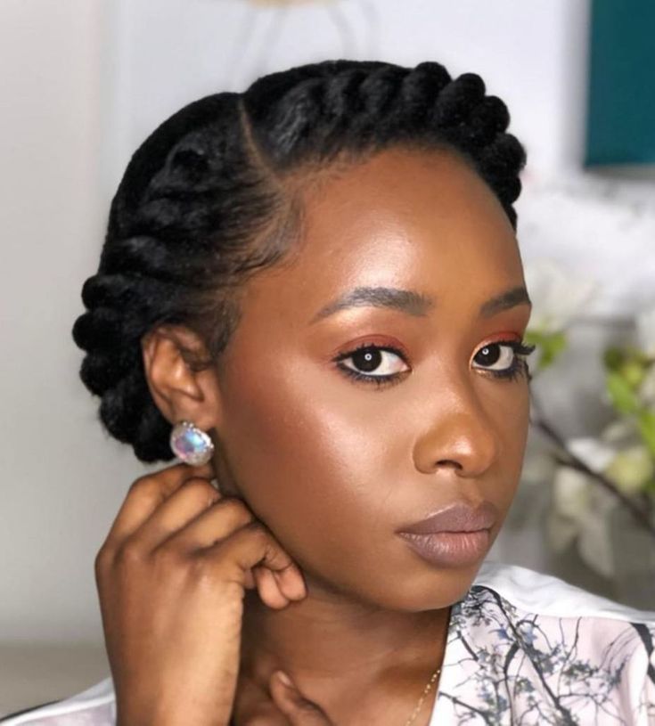Woman wearing a flat-twist crown hairstyle for rainy day