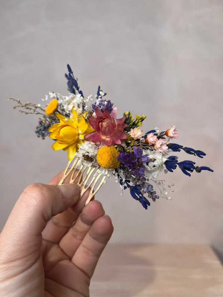 Natural updo decorated with a floral hair comb