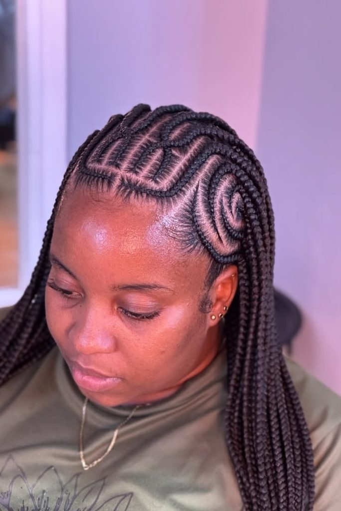 Woman wearing Fulani braids with beads on natural hair