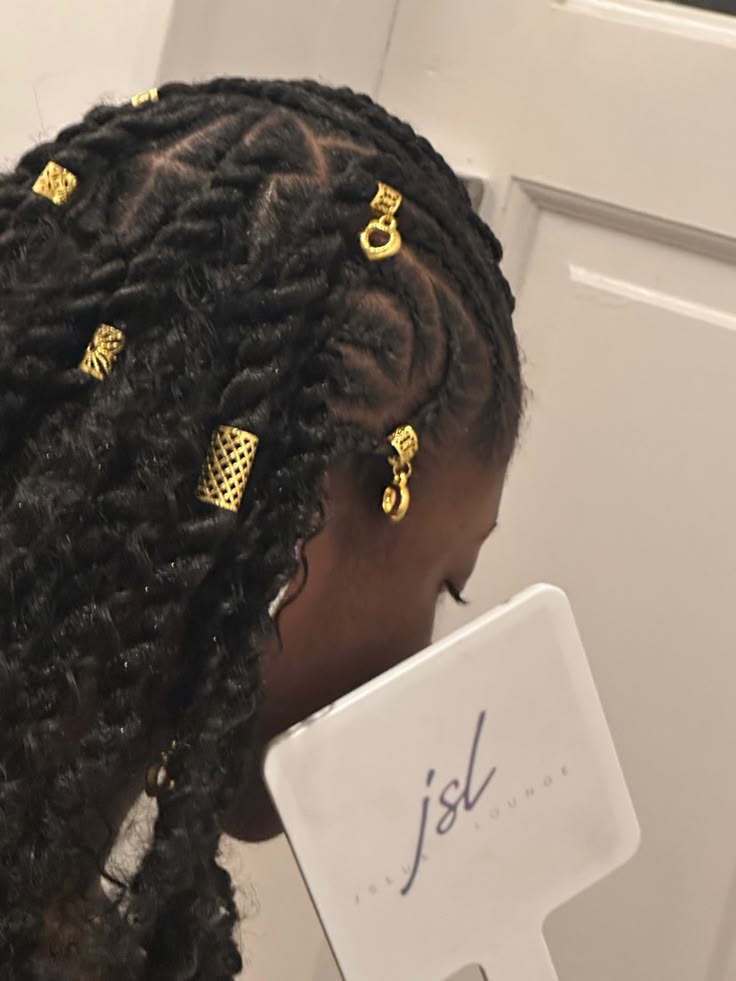 Natural twists decorated with gold hair cuffs
