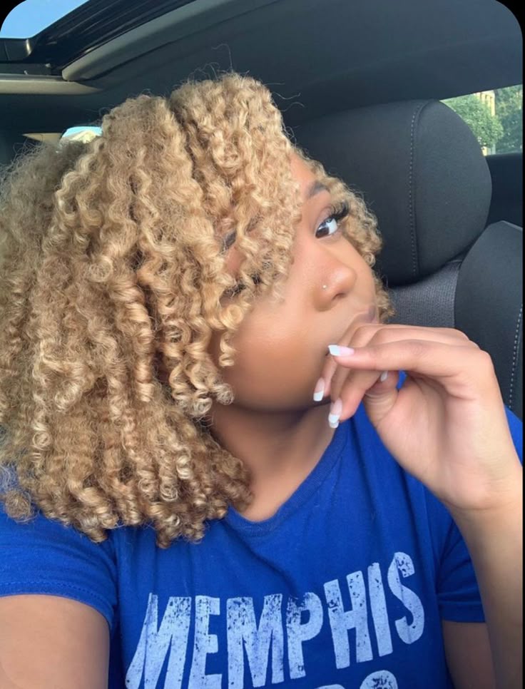  Black woman with golden blonde  natural hair color