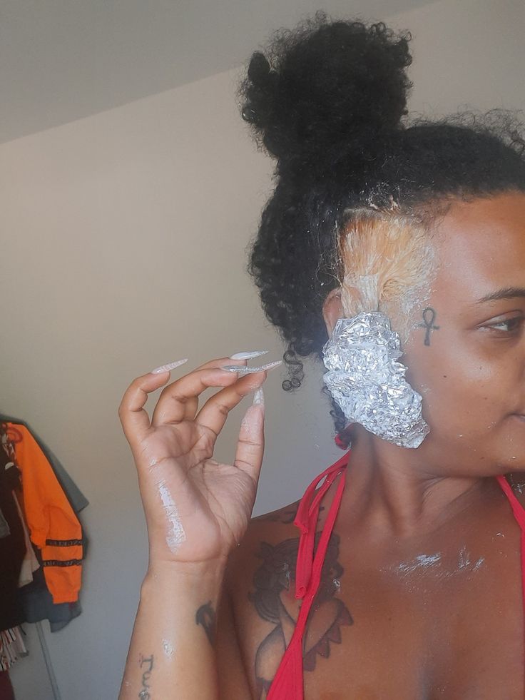 Small section of natural hair being tested with hair color