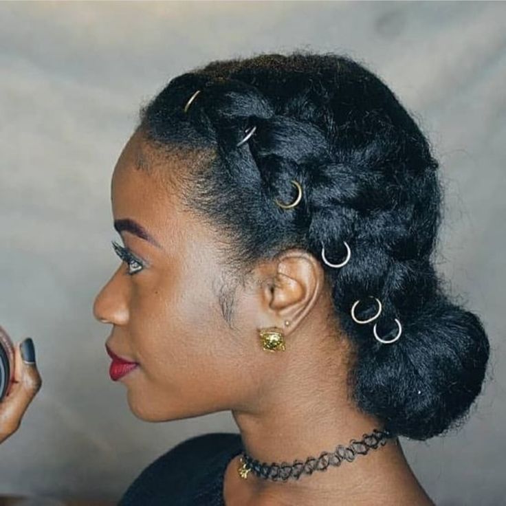 Natural braids decorated with small hair rings