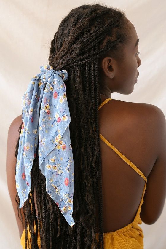 Natural hair styled with a scarf bow