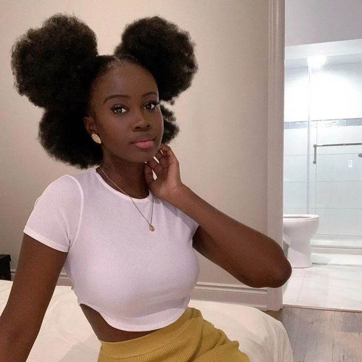Half-up double puff hairstyle on natural 4C hair