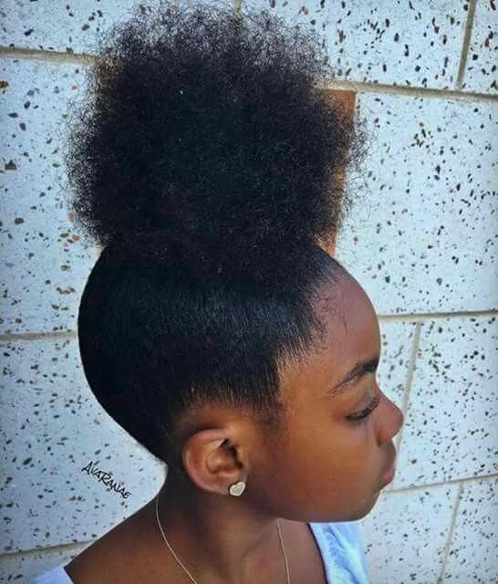High puff hairstyle on transitioning natural hair