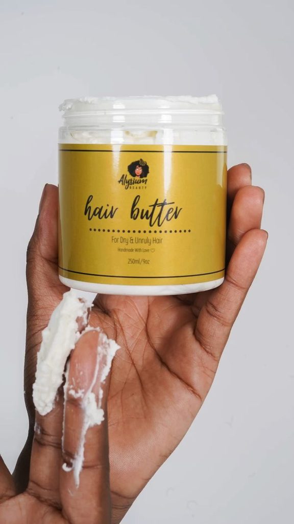 woman applying rich hair butter on her hair