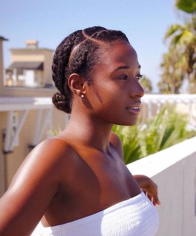 Woman wearing a natural 4C hairstyle in humid summer weather