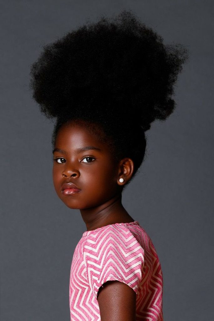 High puff on a child with natural 4C hair