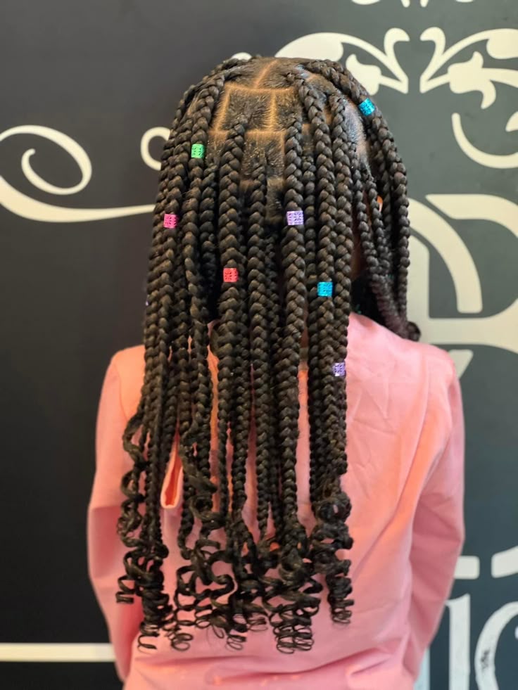 Dipped-ends box braids on a child with natural 4C hair