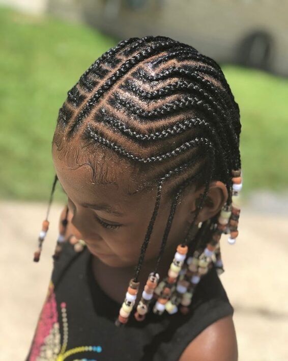 Fulani-inspired braids on a child with natural 4C hair