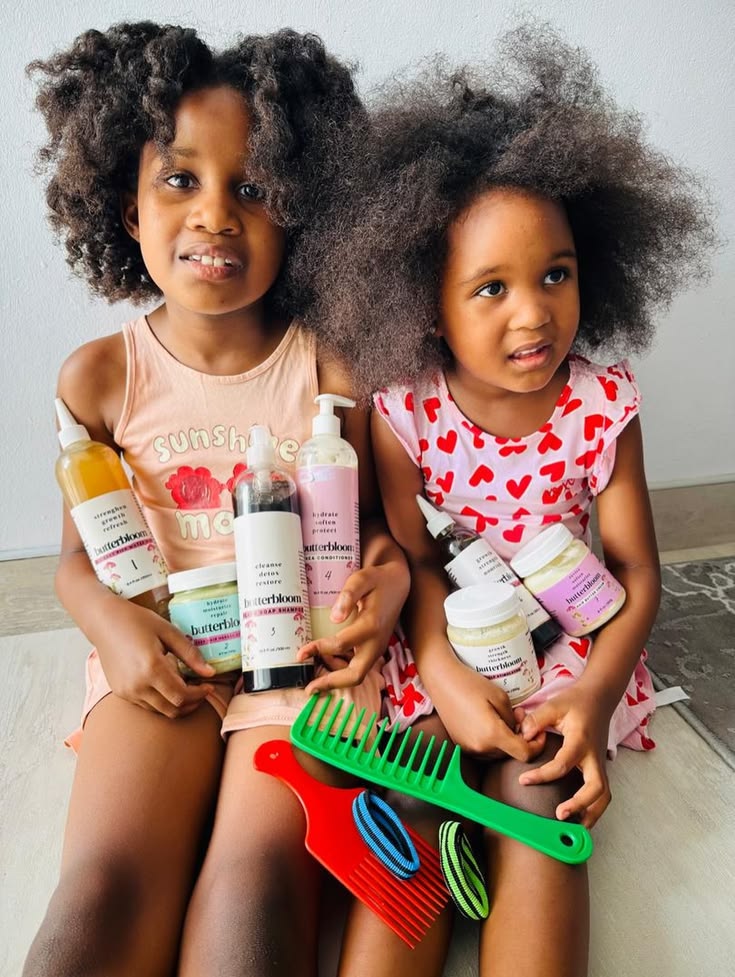 kids holding their wash day essentials