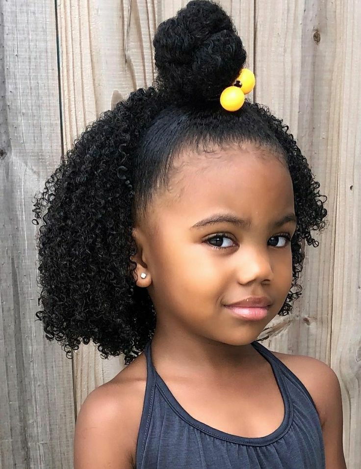 Half-up half-down afro on natural 4C hair