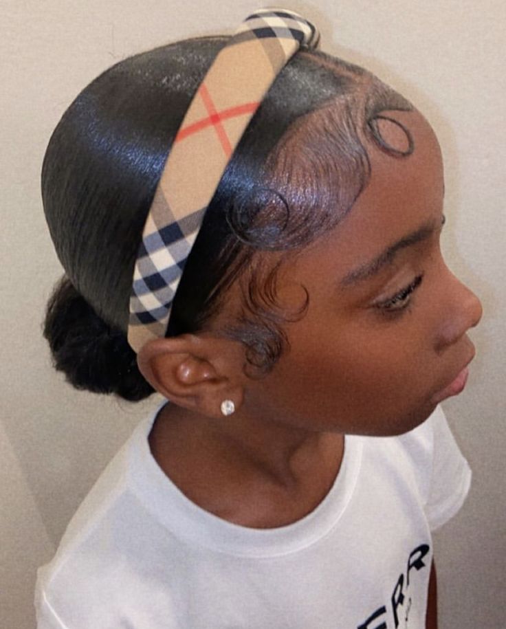 Low puff with headband on natural 4C hair