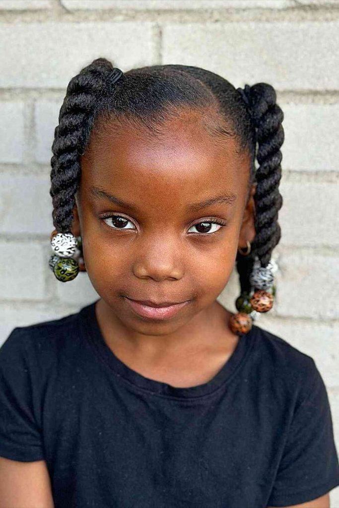 Low twisted pigtails on natural 4C hair