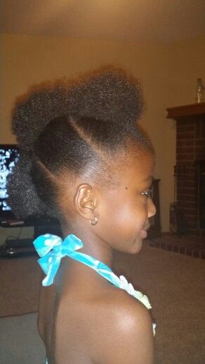 Three-puff mohawk hairstyle on natural 4C hair