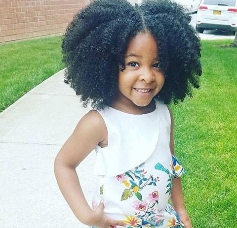 Twist-out afro on a child with natural 4C hair