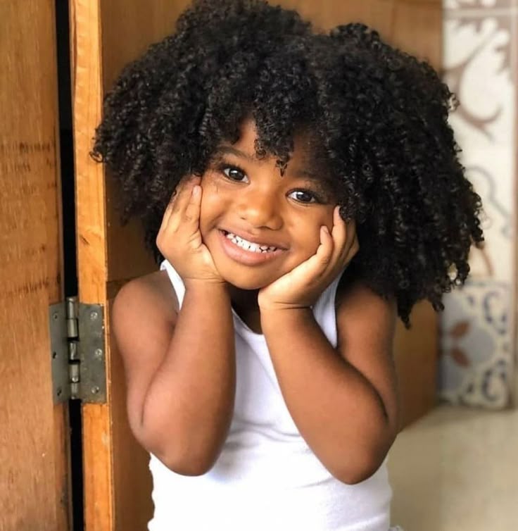Wash-and-go fro on a child with natural 4C hair