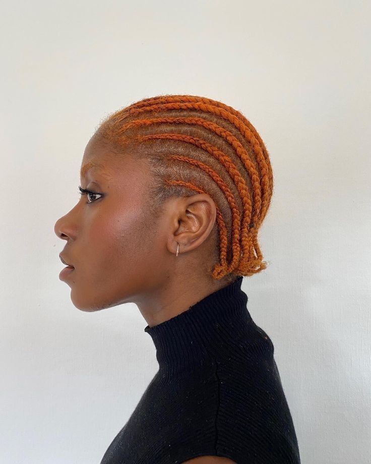 Woman wearing a simple low manipulation style with colored natural hair
