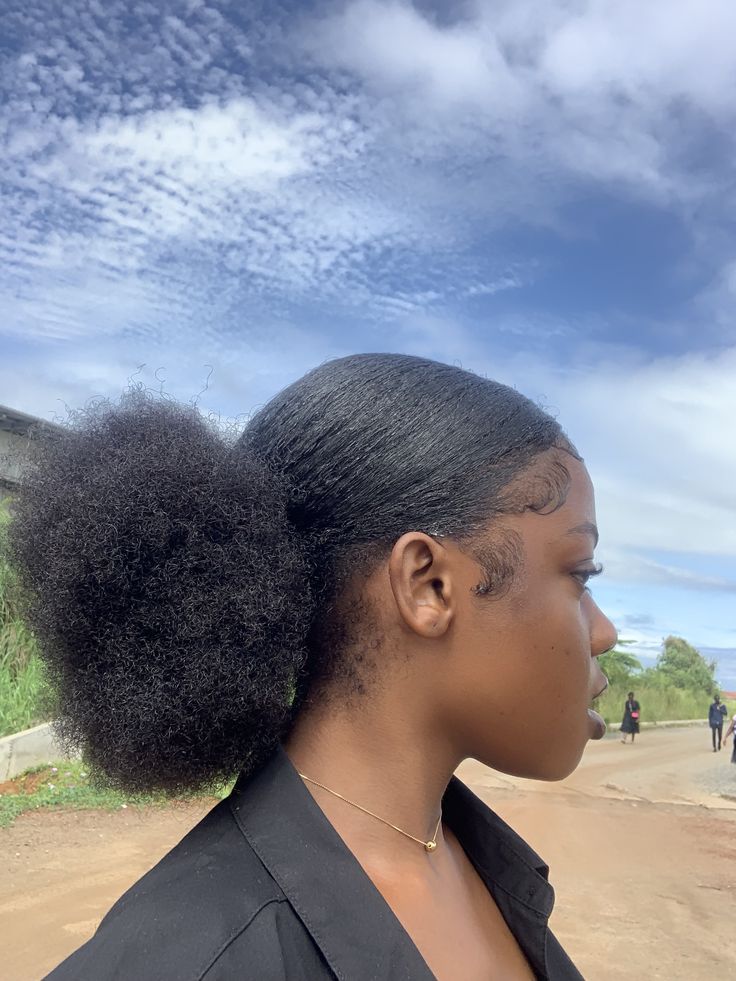 Low puff hairstyle for natural 4C hair at school