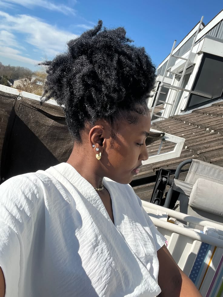 Relaxed messy high puff hairstyle on natural 4C hair