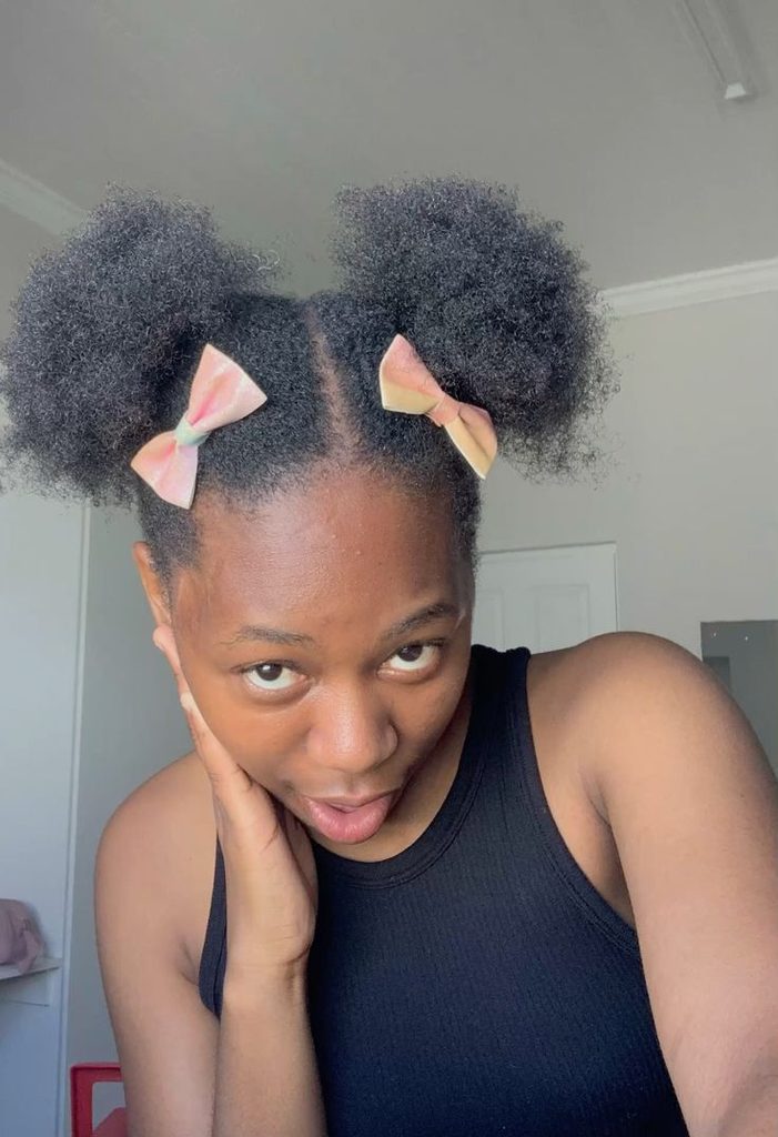 Natural hairstyle decorated with mini bows