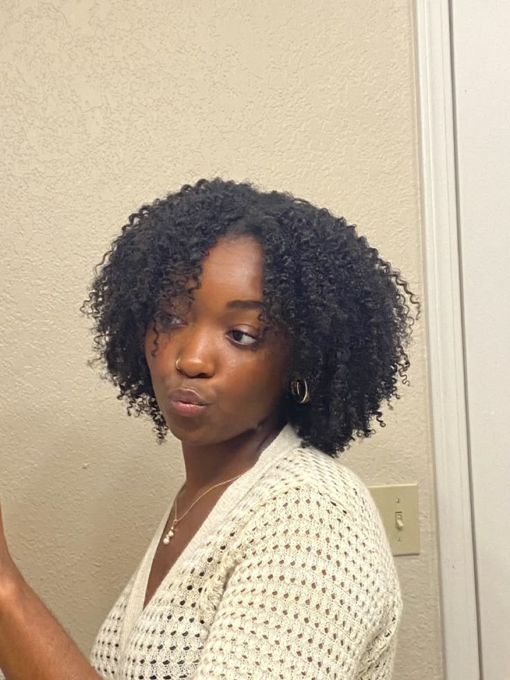 Mini twist-out with small defined natural curls