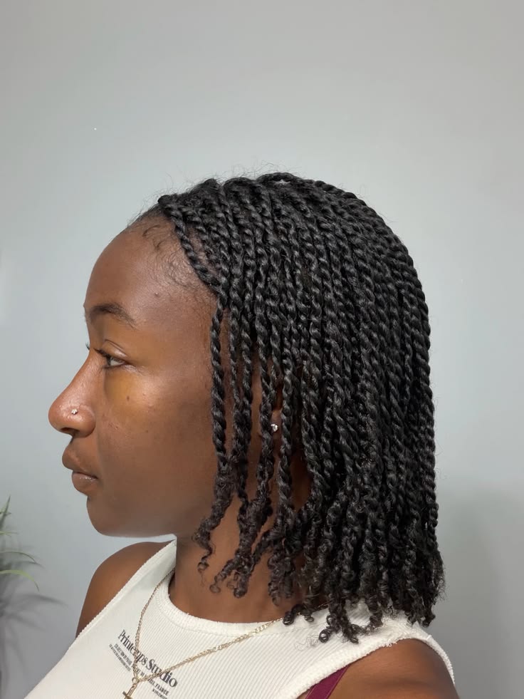 Woman wearing mini twists on natural hair for rainy day