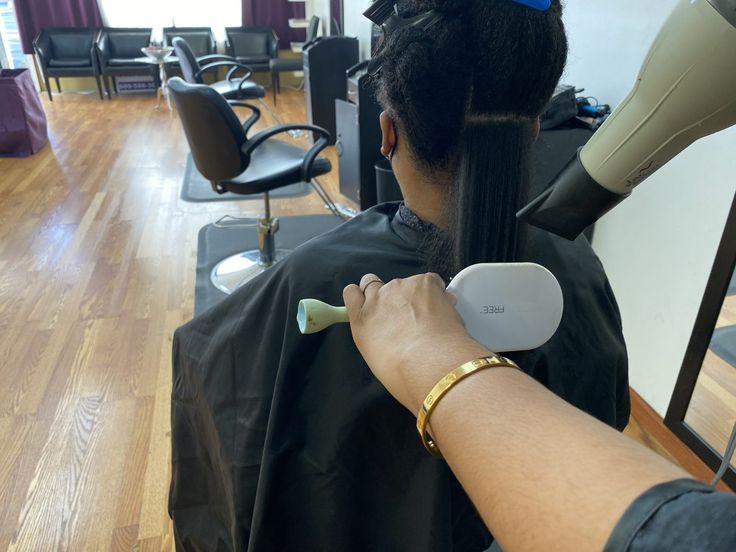 Natural hair air drying before a coloring appointment