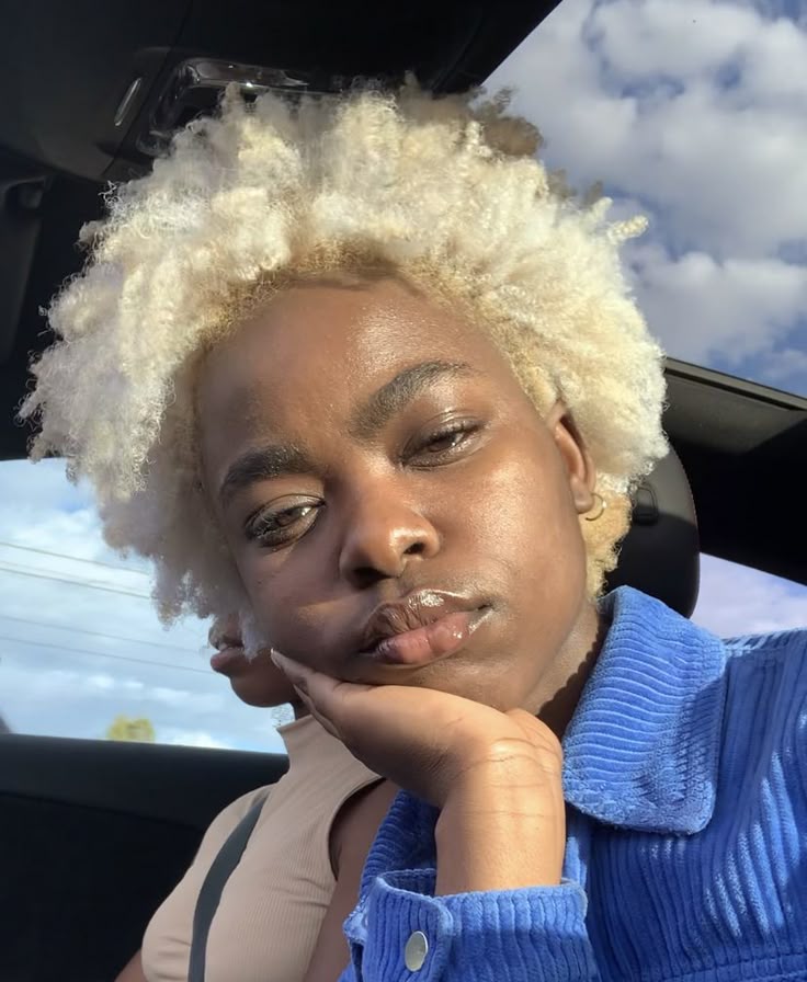 Black woman with platinum blonde  natural hair color